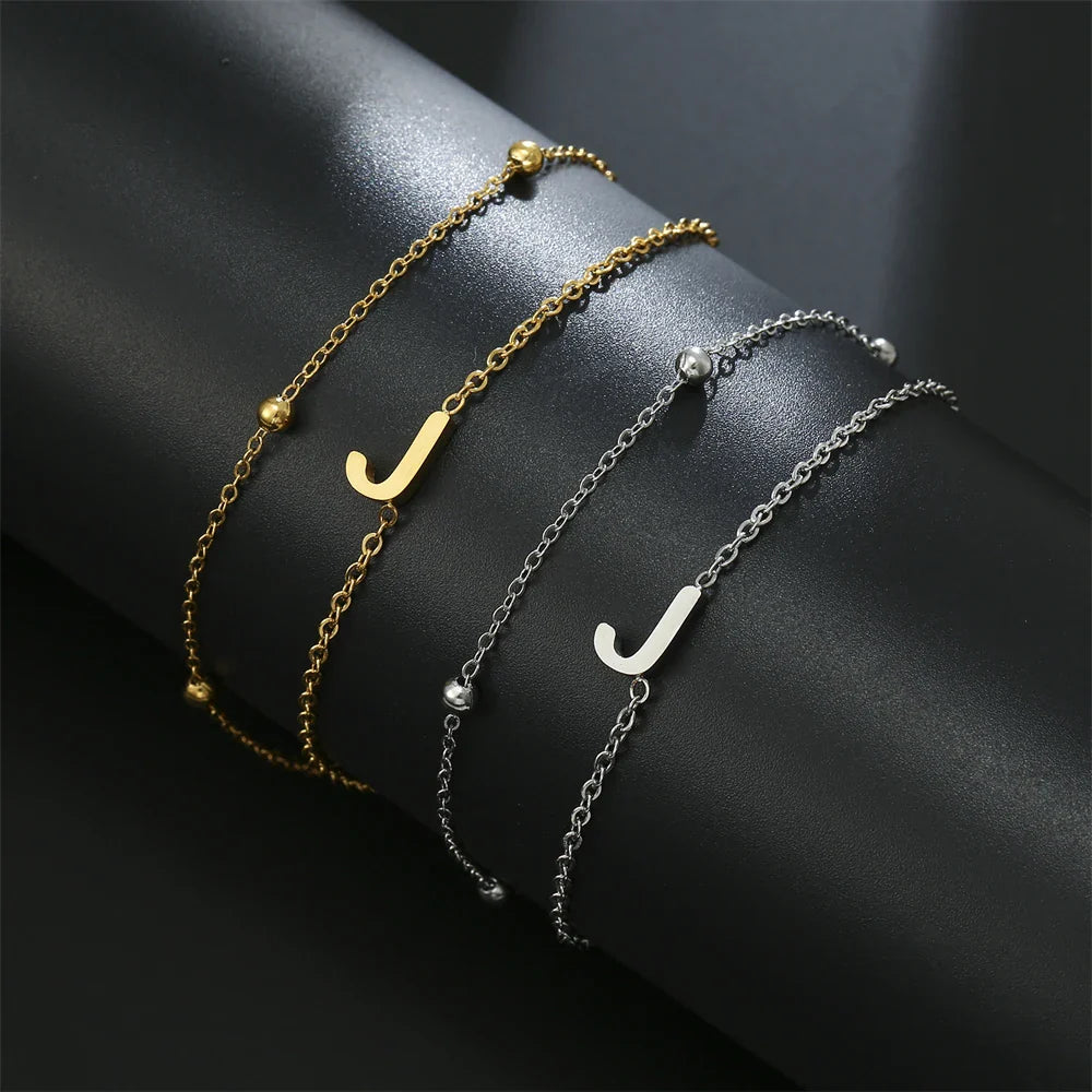 Dubbele initiaal armband goud en zilver  j