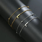 Dubbele initiaal armband goud en zilver  l