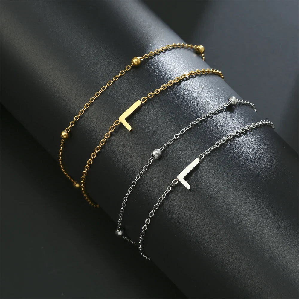 Dubbele initiaal armband goud en zilver  l