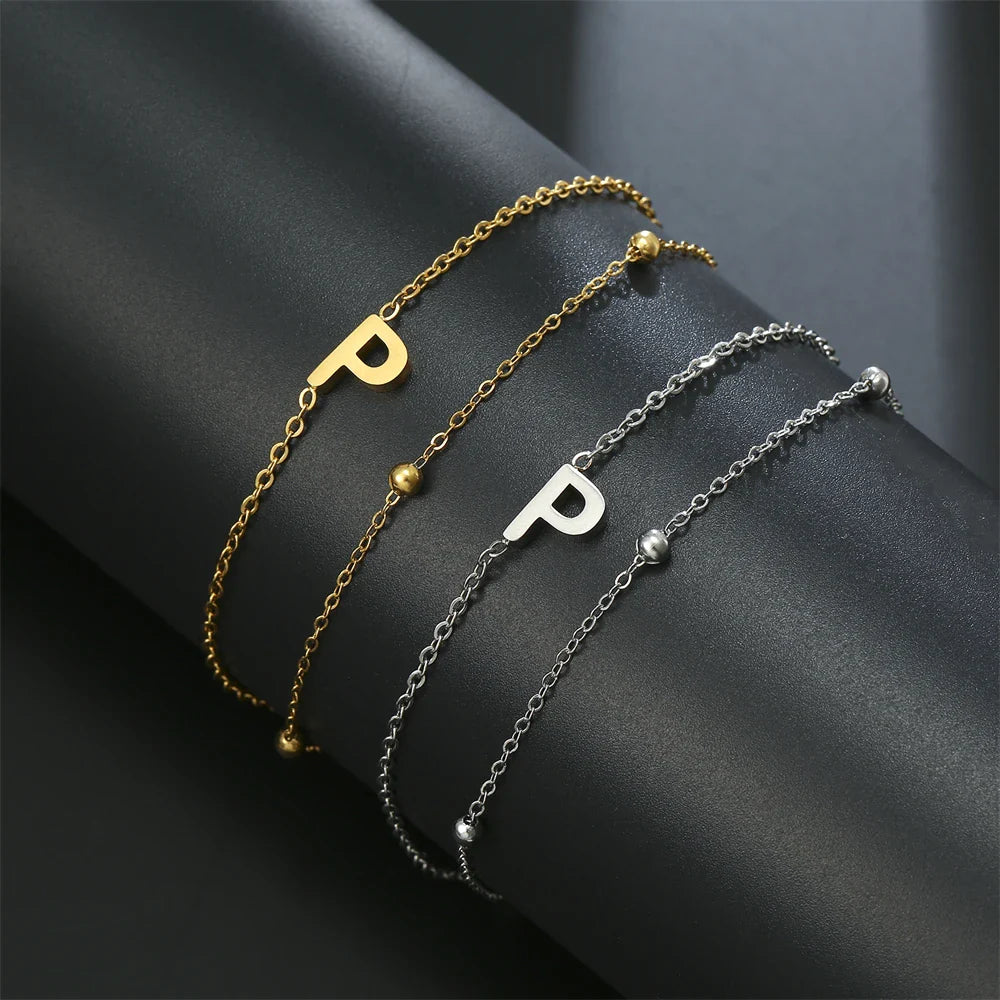 Dubbele initiaal armband goud en zilver  p