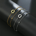 Dubbele initiaal armband goud en zilver  q