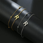 Dubbele initiaal armband goud en zilver  r