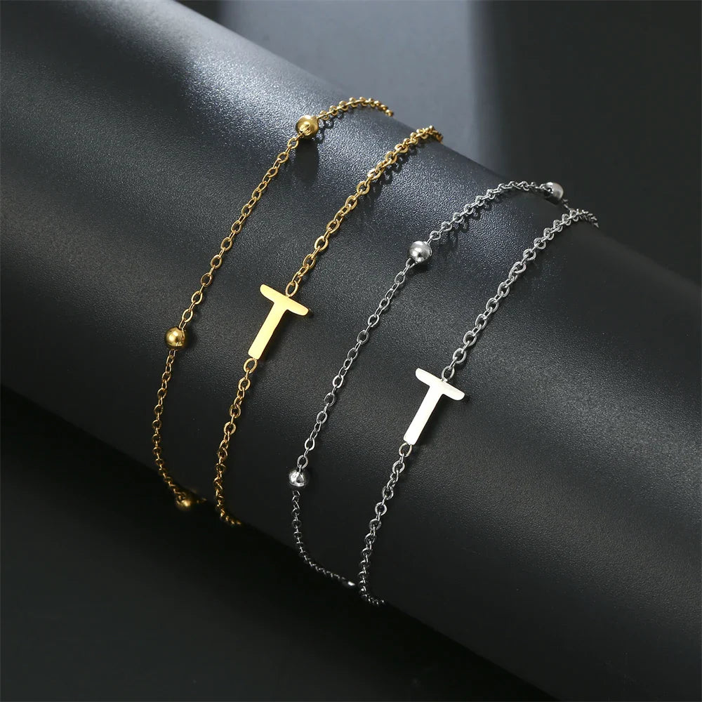 Dubbele initiaal armband goud en zilver  t
