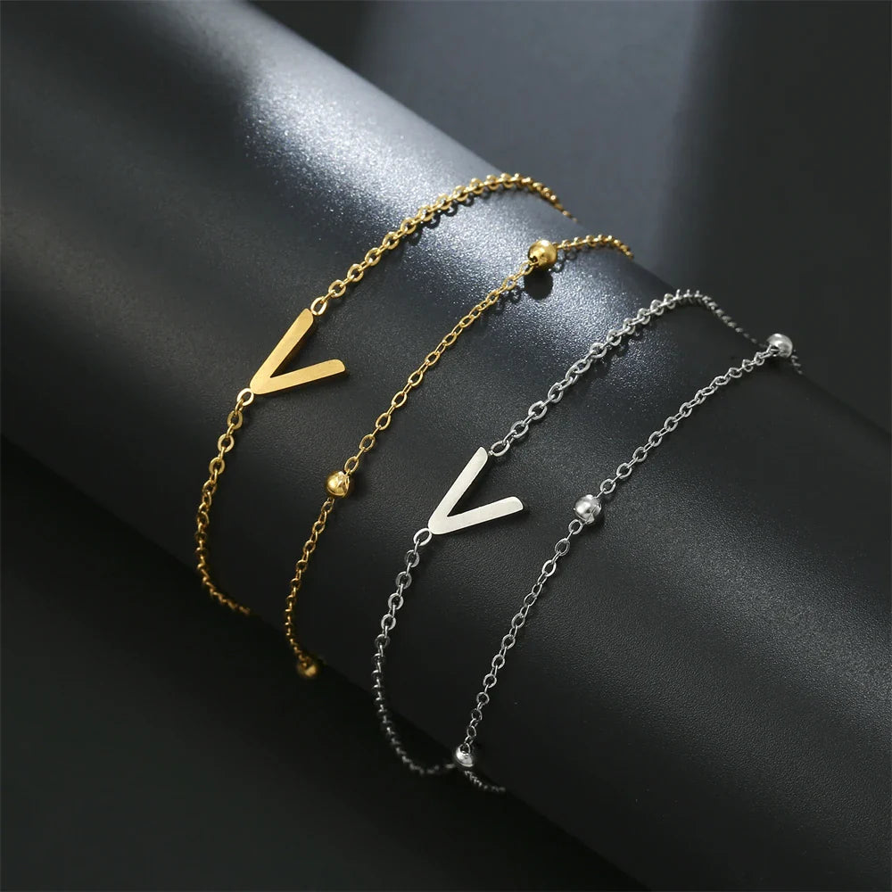 Dubbele initiaal armband goud en zilver  v
