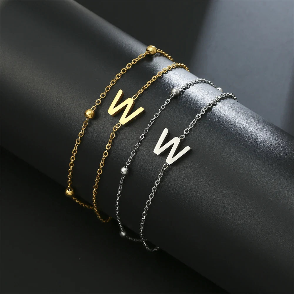 Dubbele initiaal armband goud en zilver  w