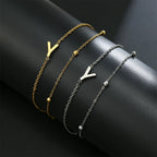 Dubbele initiaal armband goud en zilver  y