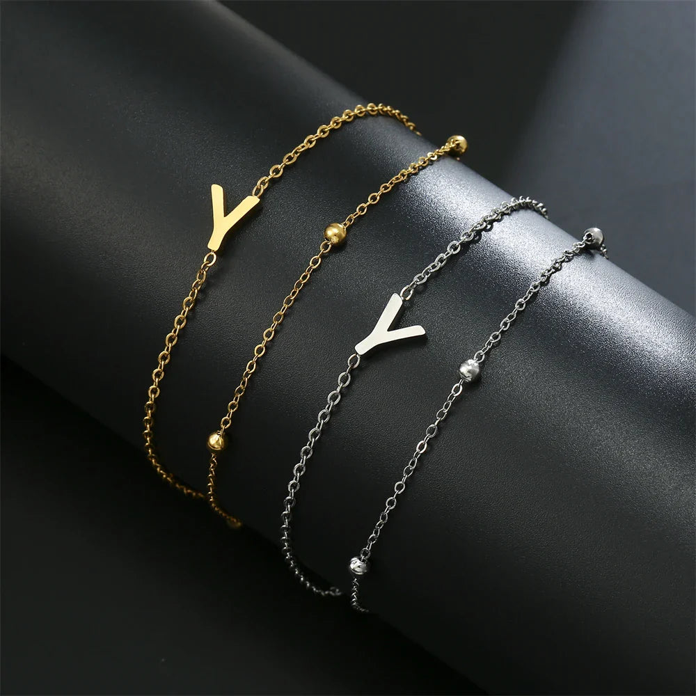Dubbele initiaal armband goud en zilver  y
