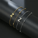 Dubbele initiaal armband goud en zilver  z