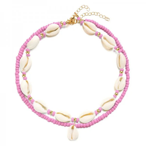 Dubbele ketting met kaurischelp roze