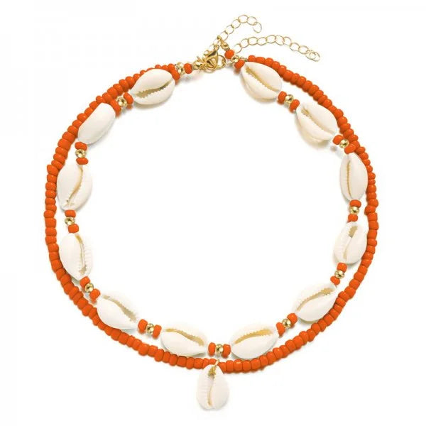 Dubbele ketting met kaurischelp rood