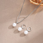 Set hangerketting en hangende pareloorbellen in eigentijdse stijl zilver