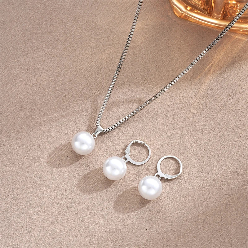 Set hangerketting en hangende pareloorbellen in eigentijdse stijl zilver