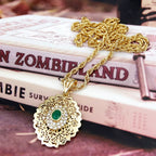 Lange ketting met traditioneel Arabisch gouden hanger groen