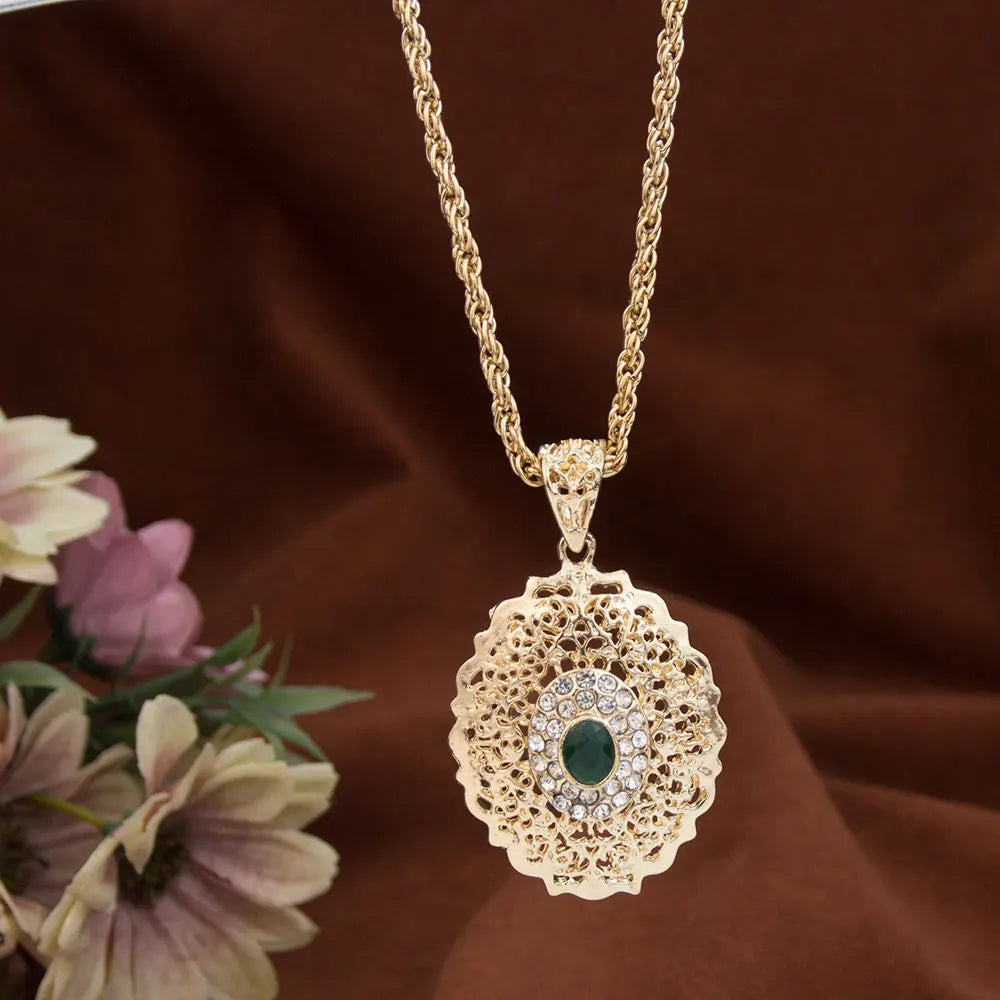 Lange ketting met traditioneel Arabisch gouden hanger groen