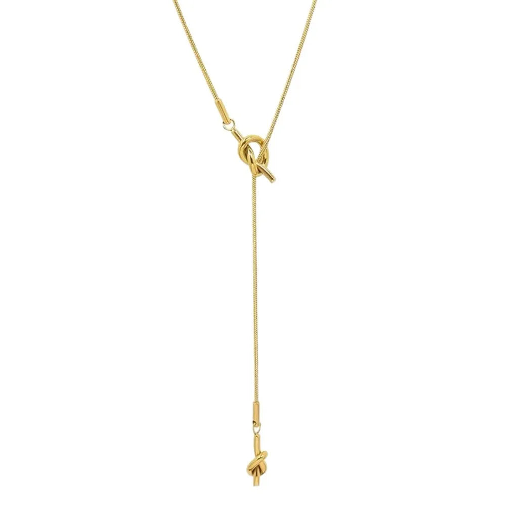 Halsketting voor de halslijn met strikhanger in design goud