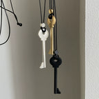 Lange koordketting met sleutelhanger in zwart
