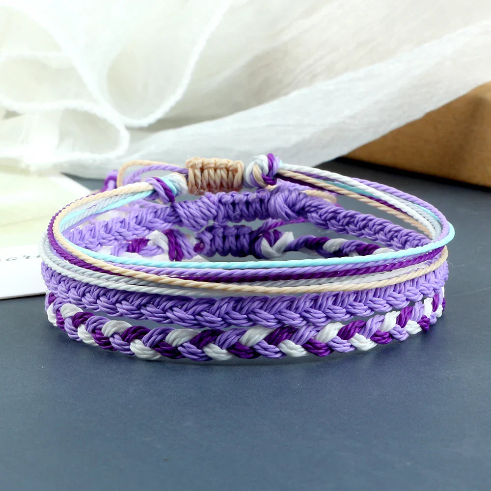 Set van 3 gevlochten, waterdichte Braziliaanse armbanden paars