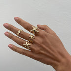 Set van 4 schelp- en zeester-ringen goud