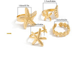 Set van 4 schelp- en zeester-ringen