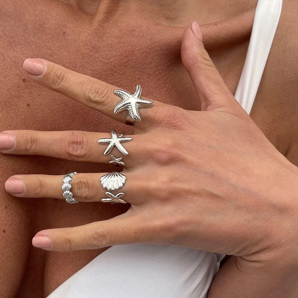 Set van 4 schelp- en zeester-ringen zilver