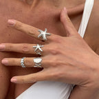 Set van 4 schelp- en zeester-ringen zilver