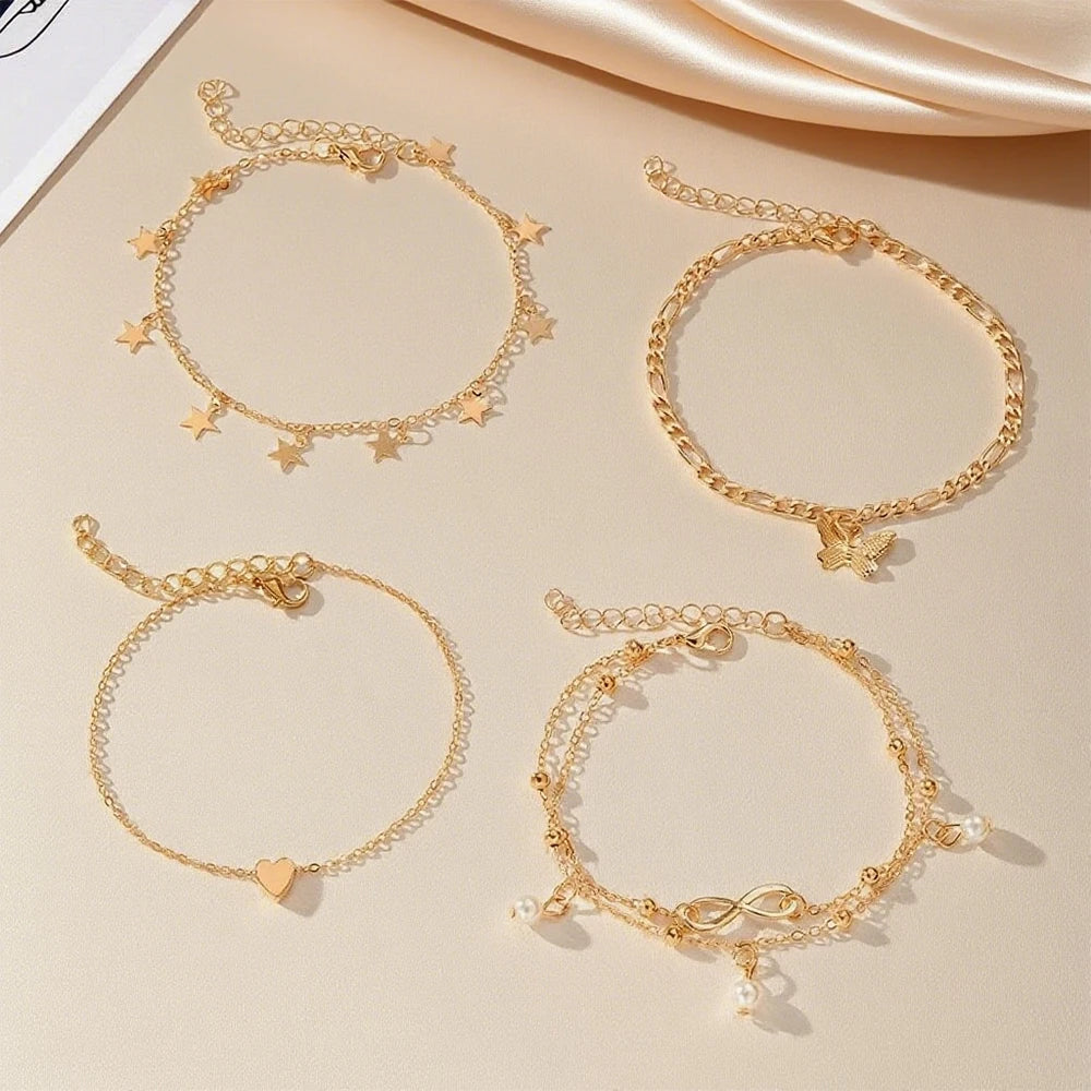Set van 5 enkelbandjes: ster, oneindig, vlinder, kralen en hart