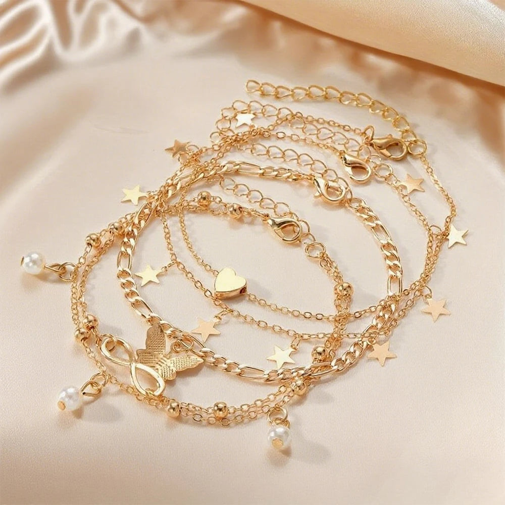 Set van 5 enkelbandjes: ster, oneindig, vlinder, kralen en hart